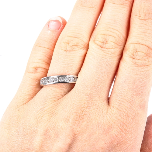 358 - A modern 9ct white gold diamond half eternity ring, set with modern round brilliant-cut diamonds, to... 