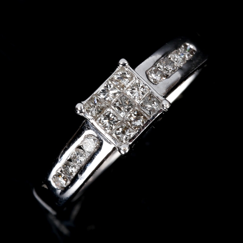 497 - A modern 18ct white gold diamond square cluster ring, set with Princess and modern round brilliant-c... 