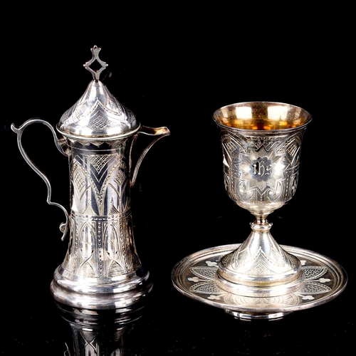 118 - A leather-cased Victorian silver 3-piece church communion set, comprising wafer dish, goblet and ewe... 