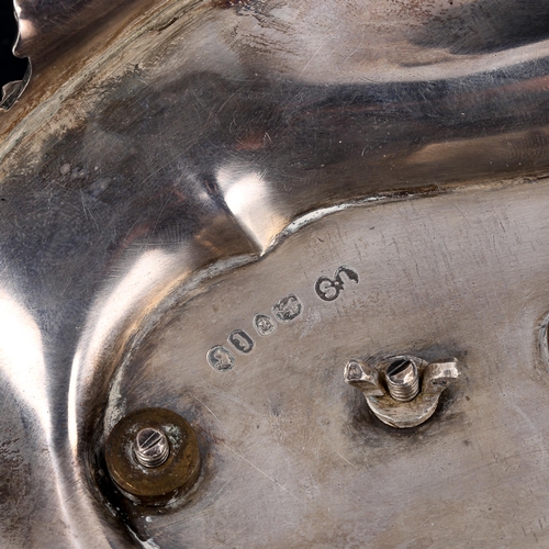 120 - A Victorian silver desk ink stand, oval form with cast foliate rim, scrolled feet and silver-mounted... 