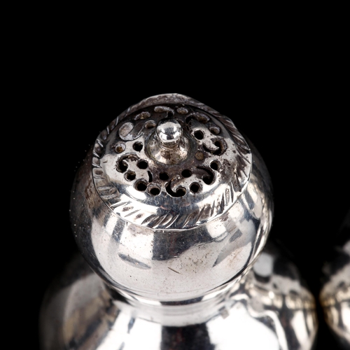 124 - A pair of Victorian silver double-gourd pepperettes, by Willian Hutton & Sons Ltd, hallmarks London ... 