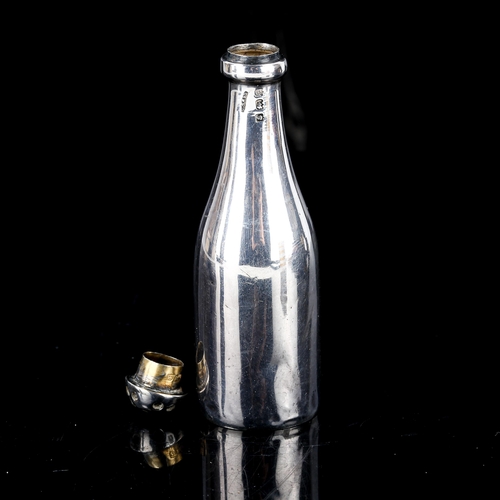 125 - An Edwardian novelty silver champagne bottle pepperette, by Cornelius Desormeaux Saunders and James ... 