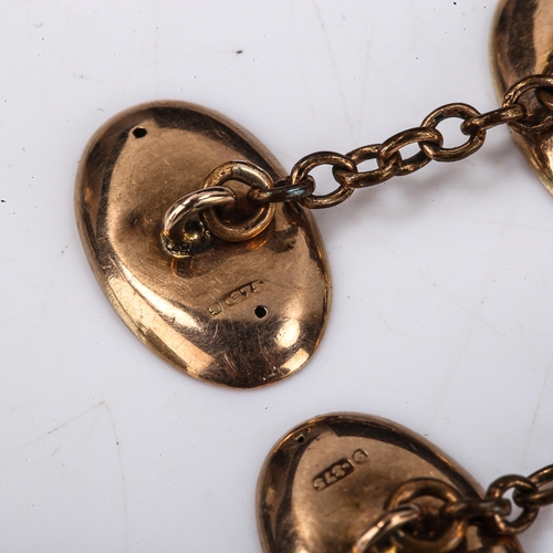 130 - A pair of late Victorian 9ct rose gold oval panel cufflinks, engraved floral decoration, hallmarks B... 