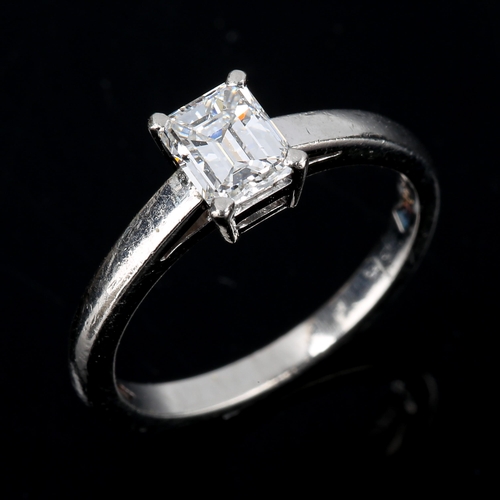 137 - ASPREY - a 0.55ct emerald-cut solitaire diamond ring, platinum plain 4-claw setting, colour approx F... 