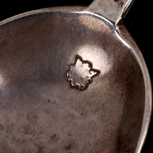 138 - A Commonwealth silver Puritan spoon, slight tapering stem with plain oval bowl, owner's initials EG,... 