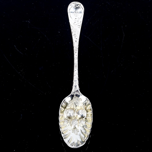 146 - A George II silver berry spoon, all over engraved and embossed decoration, by Philip Roker II, hallm... 