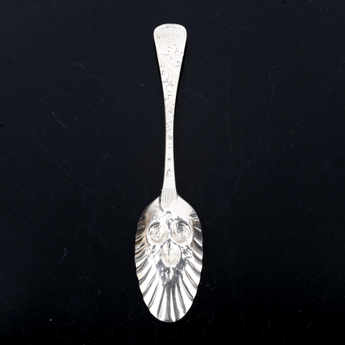 146 - A George II silver berry spoon, all over engraved and embossed decoration, by Philip Roker II, hallm... 