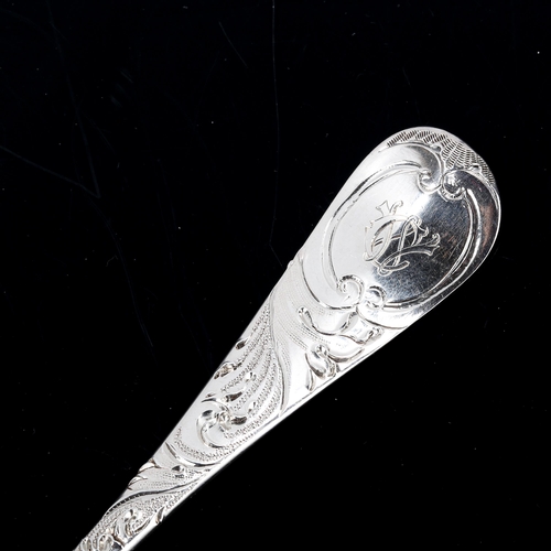 146 - A George II silver berry spoon, all over engraved and embossed decoration, by Philip Roker II, hallm... 