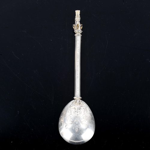 149 - A German silver replica 16th century spoon, after an example from the Spitzer Collection, engraved w... 