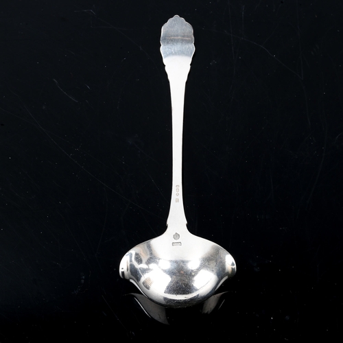 151 - GEORG JENSEN - an early 20th century Danish stylised sterling silver sauce ladle, import hallmarks L... 