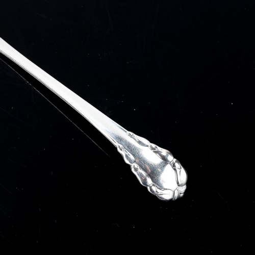 151 - GEORG JENSEN - an early 20th century Danish stylised sterling silver sauce ladle, import hallmarks L... 