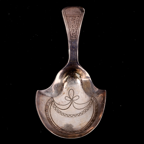 153 - A George III silver shovel caddy spoon, bright-cut engraved decoration, maker's marks IT, possibly J... 