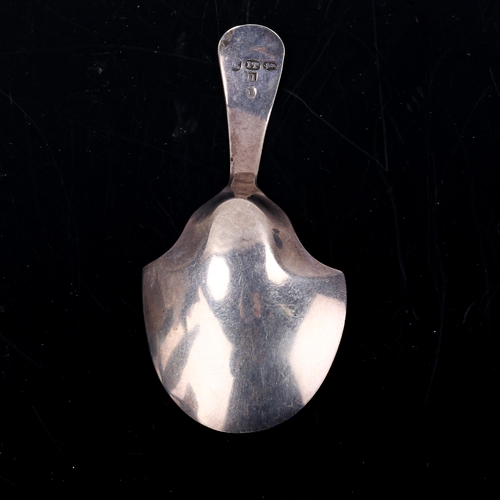 153 - A George III silver shovel caddy spoon, bright-cut engraved decoration, maker's marks IT, possibly J... 