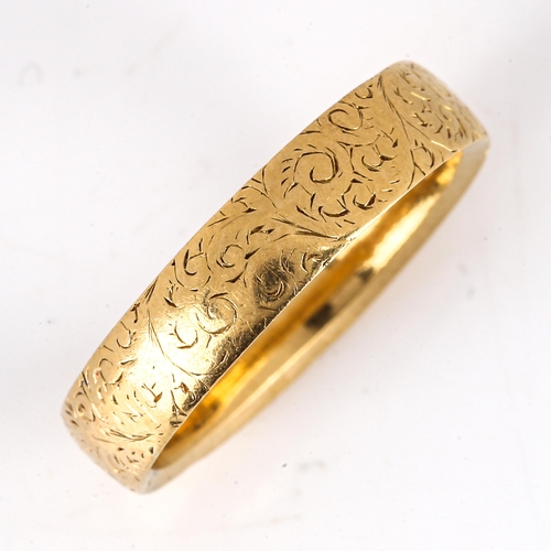 163 - A heavy Victorian 18ct gold wedding band ring, engraved foliate decoration, maker's marks GB, hallma... 