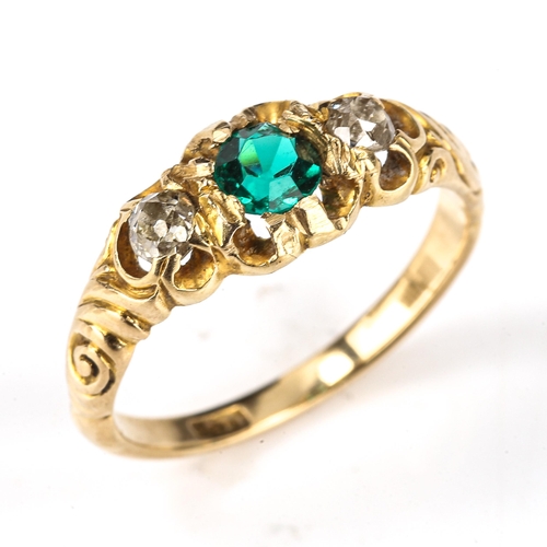 175 - An Antique 3-stone dress ring, unmarked gold settings with green glass and old-cut diamonds, total d... 