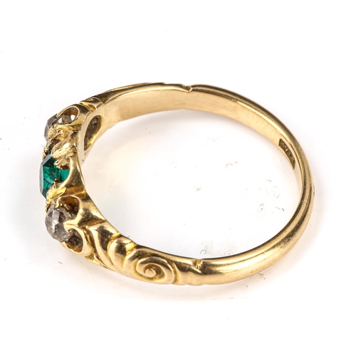 175 - An Antique 3-stone dress ring, unmarked gold settings with green glass and old-cut diamonds, total d... 