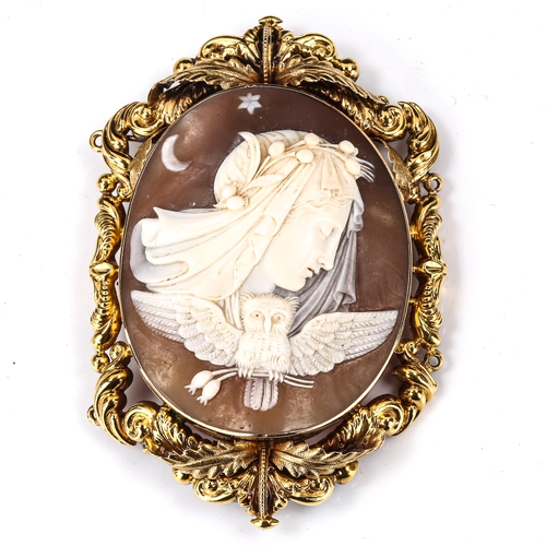 181 - A large Victorian shell cameo brooch, depicting Nyx, Goddess of the Night, and the Owl, in unmarked ... 