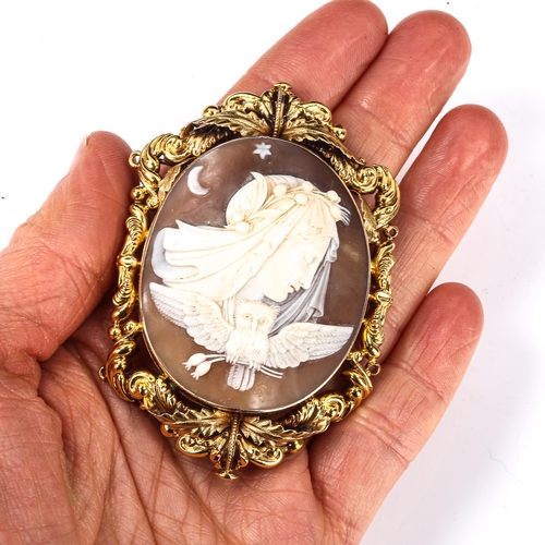 181 - A large Victorian shell cameo brooch, depicting Nyx, Goddess of the Night, and the Owl, in unmarked ... 