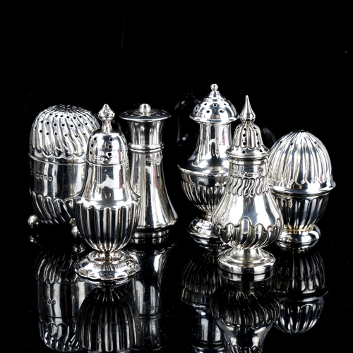 188 - 7 silver pepperettes, including miniature flagon example, largest height 7cm, 4.4oz total (7)