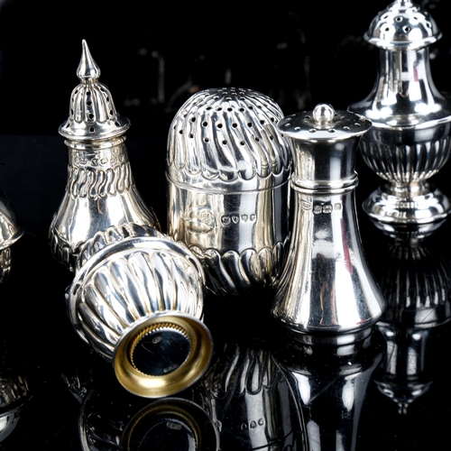 188 - 7 silver pepperettes, including miniature flagon example, largest height 7cm, 4.4oz total (7)