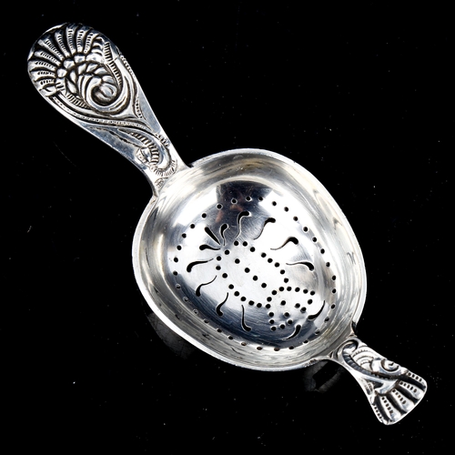 191 - J TOSTRUP - a Vintage Norwegian silver Viking Revival tea strainer, length 13cm, 1.4oz