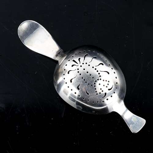 191 - J TOSTRUP - a Vintage Norwegian silver Viking Revival tea strainer, length 13cm, 1.4oz