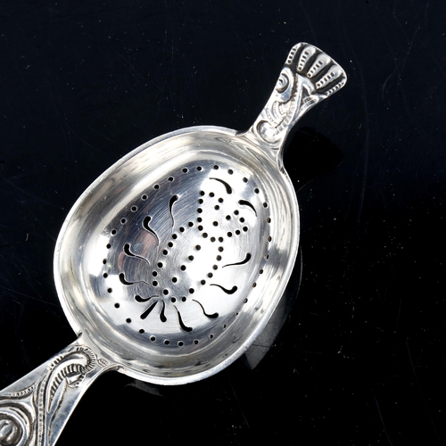 191 - J TOSTRUP - a Vintage Norwegian silver Viking Revival tea strainer, length 13cm, 1.4oz