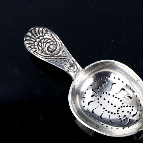 191 - J TOSTRUP - a Vintage Norwegian silver Viking Revival tea strainer, length 13cm, 1.4oz