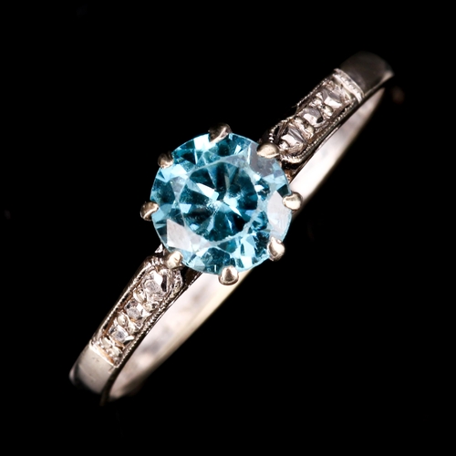 194 - A 9ct white gold solitaire blue zircon ring, zircon measures: 5.63mm x 3.38mm, size M, 1.8g