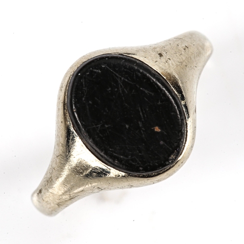 196 - An early 20th century 18ct white gold black onyx signet ring, maker's marks G and C, hallmarks Londo... 