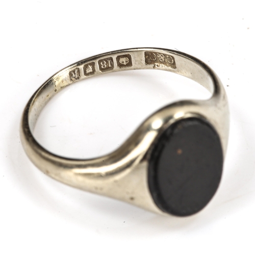 196 - An early 20th century 18ct white gold black onyx signet ring, maker's marks G and C, hallmarks Londo... 