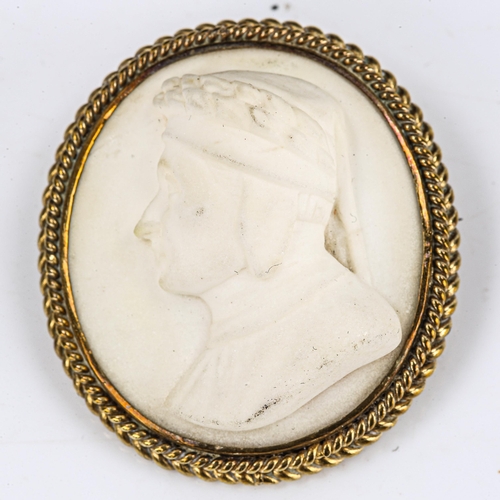 198 - A 19th century relief carved alabaster cameo brooch, depicting profile of Dante, in brass rope twist... 