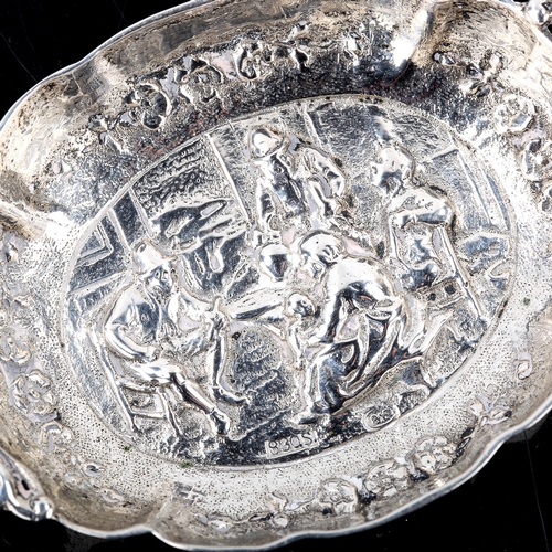 207 - A small Scandinavian silver pin dish, relief embossed tavern decoration, maker's marks EWE, length 8... 