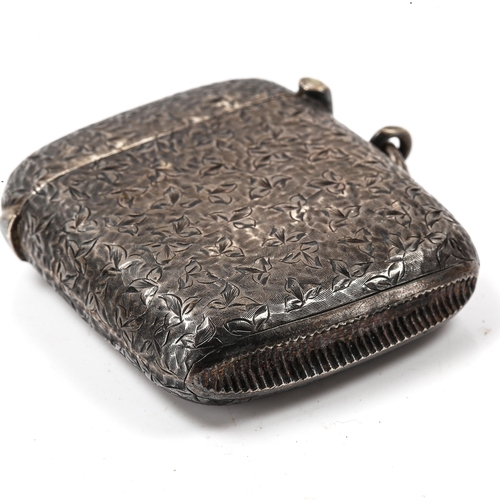 212 - An Edwardian silver Vesta case, allover engraved floral decoration, by William Neale & Sons, hallmar... 