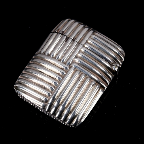 213 - A Victorian silver basket weave Vesta case, indistinct maker's marks, hallmarks Birmingham 1890, len... 