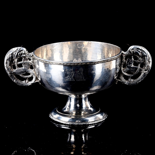 214 - An Arts and Crafts silver 2-handled trophy, with dolphin handles, by Edward Spencer for the Artifice... 