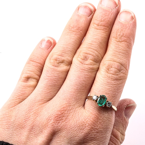 217 - A modern 9ct gold 3-stone emerald and diamond ring, set with oval mixed-cut emerald and modern round... 