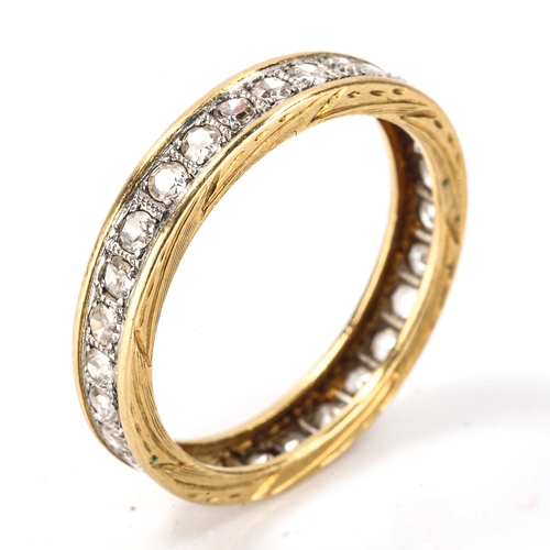 218 - A diamond eternity ring, unmarked gold settings with single-cut diamonds, total diamond content appr... 