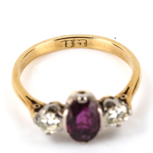 224 - An 18ct gold 3-stone ruby and diamond ring, set with oval mixed-cut ruby and modern round brilliant-... 