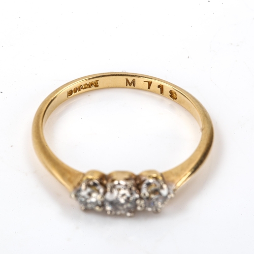 225 - An 18ct gold 3-stone diamond ring, set with round brilliant-cut diamonds, total diamond content appr... 