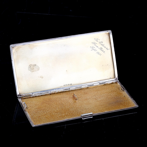 234 - A large George VI Art Deco silver cigarette case, rectangular form with allover engine turned decora... 