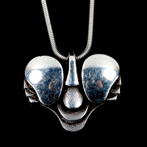 299 - JAN LOHMANN - a Vintage Danish stylised sterling silver figural butterfly pendant necklace, on sterl... 