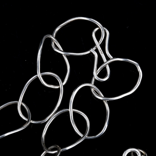 315 - A modern sterling silver hoop link necklace, and a similar white metal bracelet, lengths 40cm and 20... 