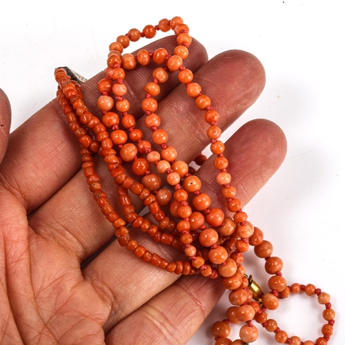 317 - A group of coral bead jewellery, comprising 2 necklaces and 1 bracelet, 27.6g total (3)