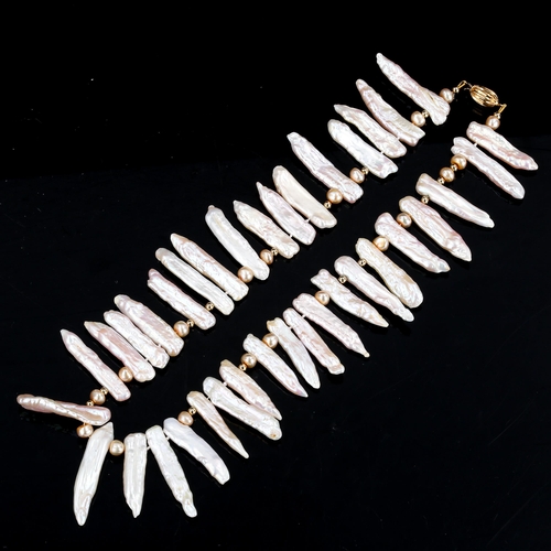 324 - A modern pink Baroque pearl fringe necklace, on 9ct clasp, necklace length 40cm, 63.2g