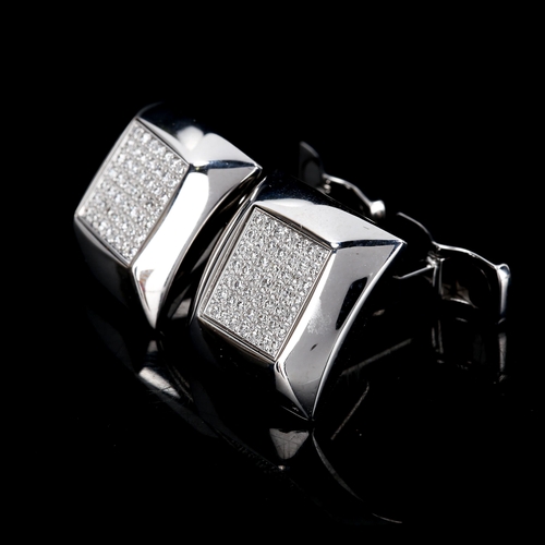 327 - A modern pair of 18ct white gold diamond cluster cufflinks, square panels set with round brilliant-c... 