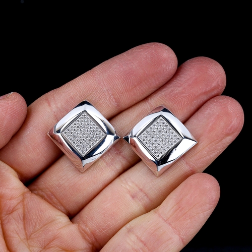 327 - A modern pair of 18ct white gold diamond cluster cufflinks, square panels set with round brilliant-c... 