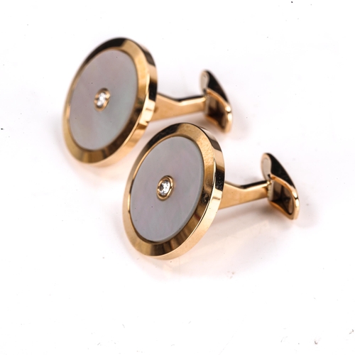 328 - A modern pair of 18ct gold mother-of-pearl and diamond target panel cufflinks, total diamond content... 