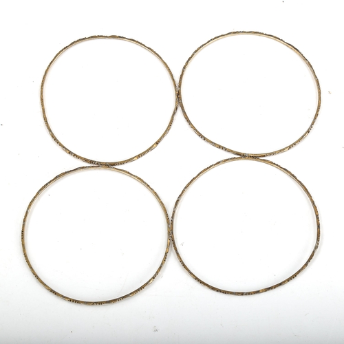 369 - *Withdrawn* 4 Indian unmarked gold bangles, tests as 9ct, diameter 6cm, 14.1g total (4)