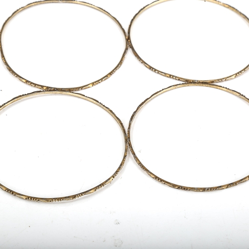 369 - *Withdrawn* 4 Indian unmarked gold bangles, tests as 9ct, diameter 6cm, 14.1g total (4)